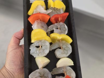 2 King Prawn Kebabs on a tray before cookin.