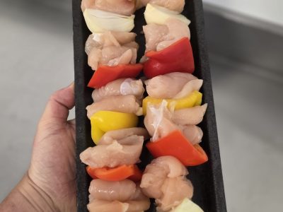 2 x chicken and veg kebabs before cooking.